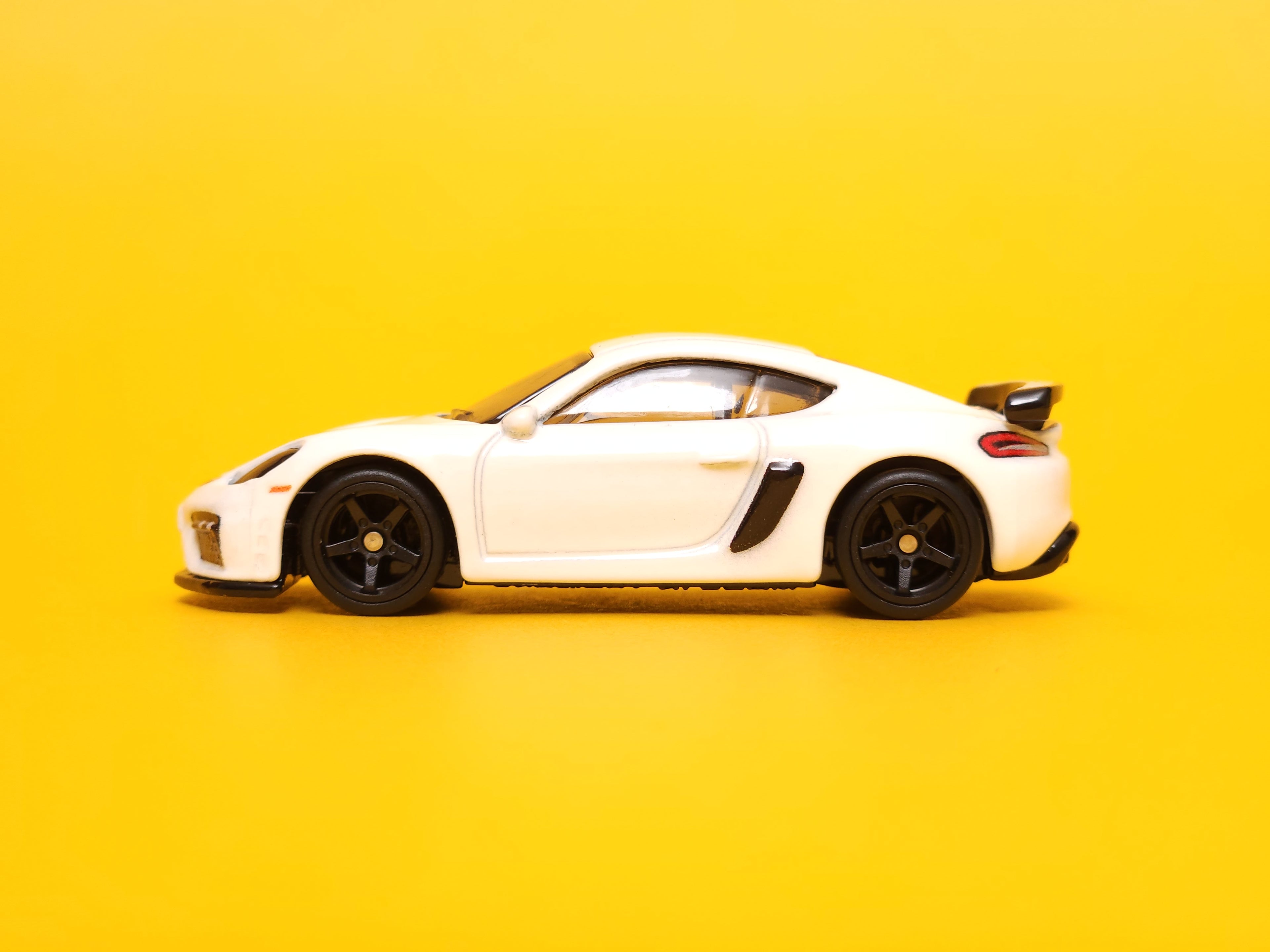 Porsche 718 Cayman GT4: Carrara White – 2023 Mattel Hot Wheels Premium 1st Edition