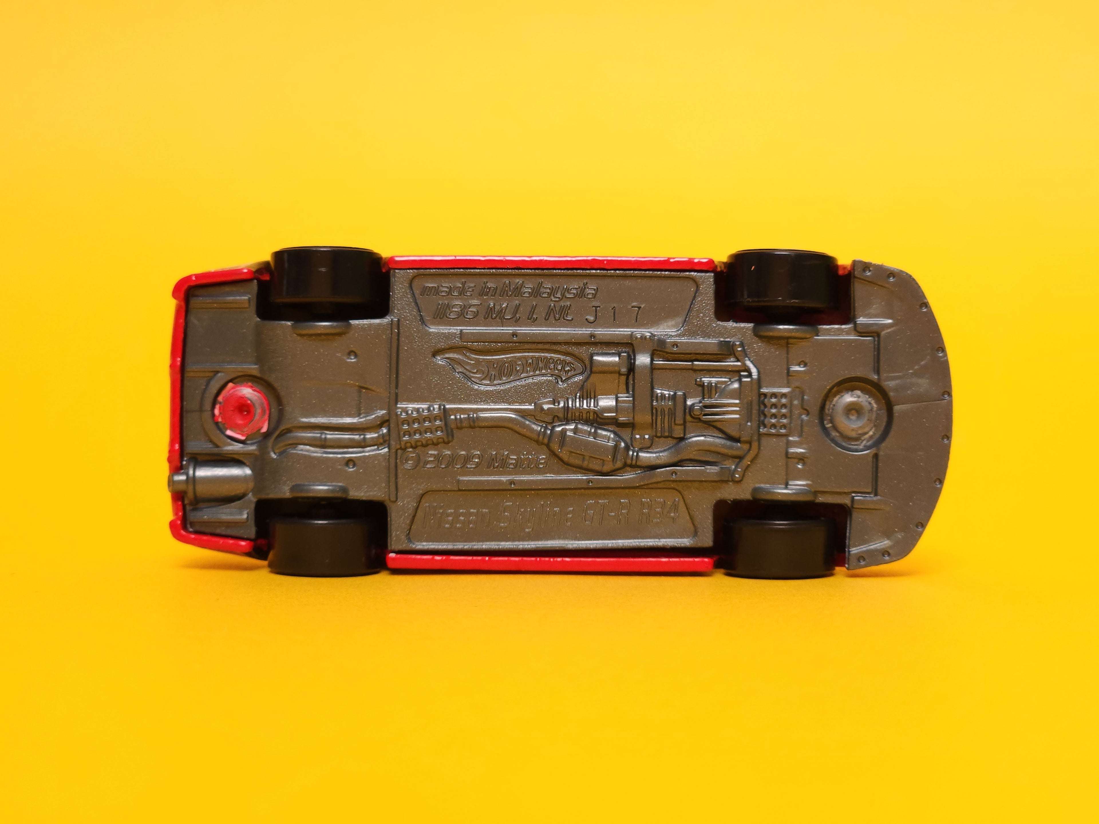 Nissan Skyline GT-R R34: Need For Speed Red – 2016 Mattel Hot Wheels Basic