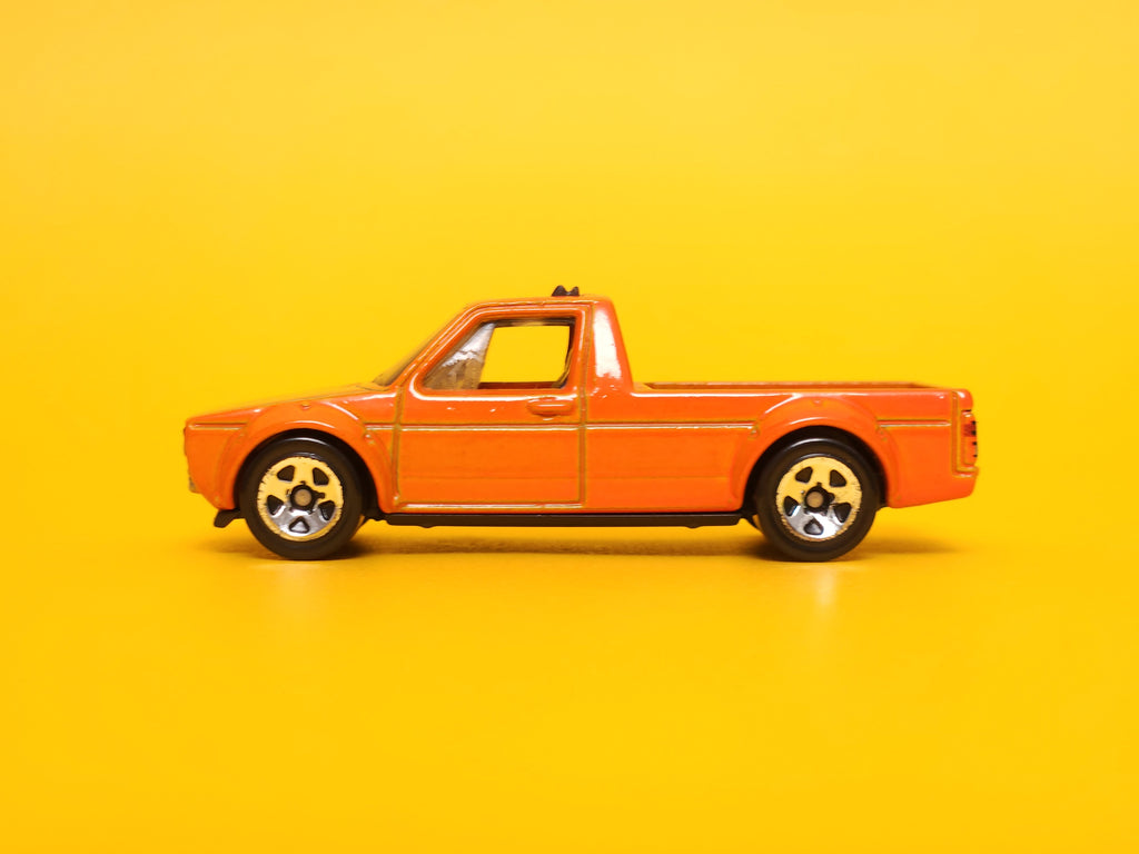 Volkswagen Caddy: Orange – 2015 Mattel Hot Wheels Basic 1st Edition