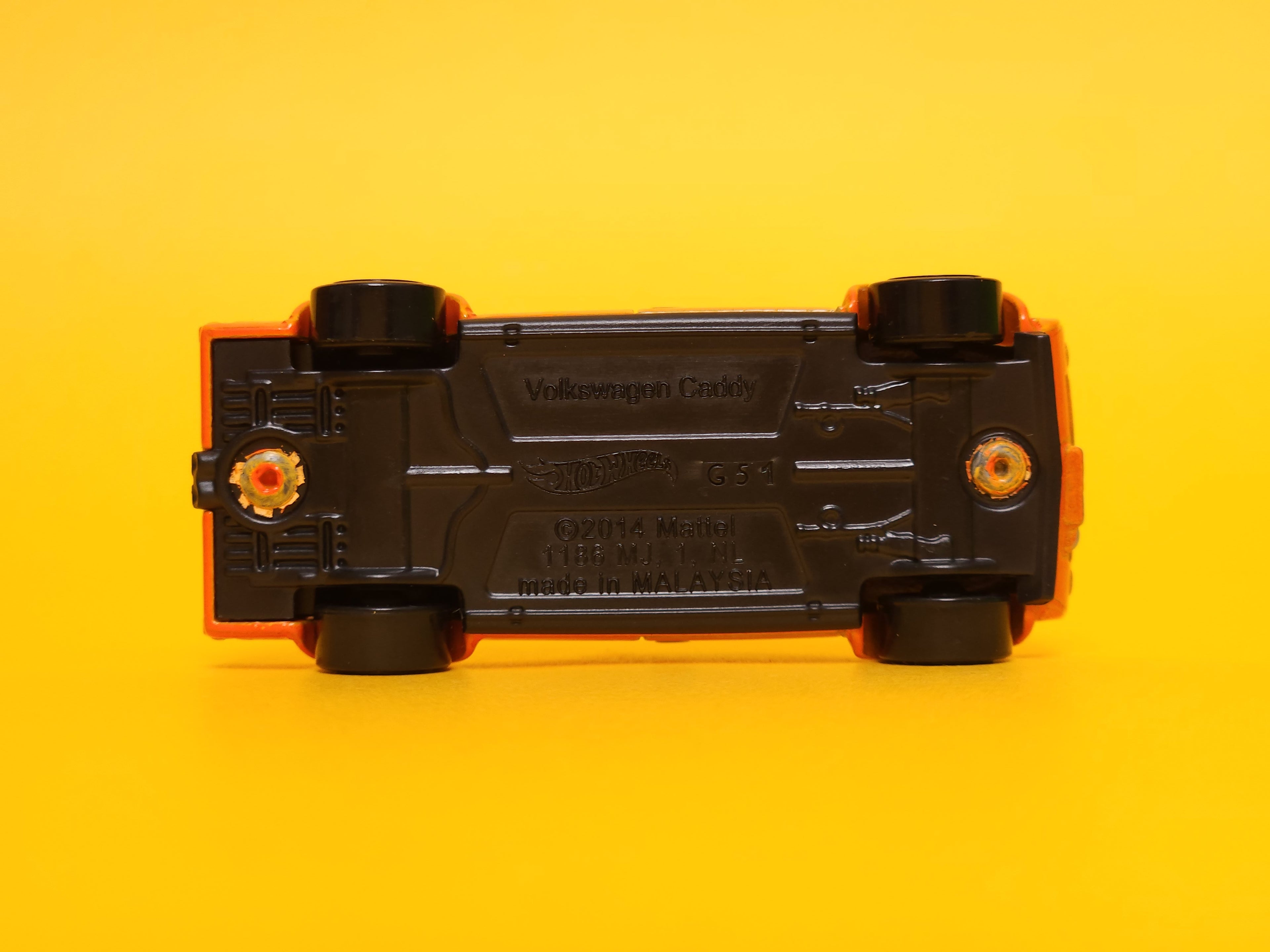 Volkswagen Caddy: Orange – 2015 Mattel Hot Wheels Basic 1st Edition
