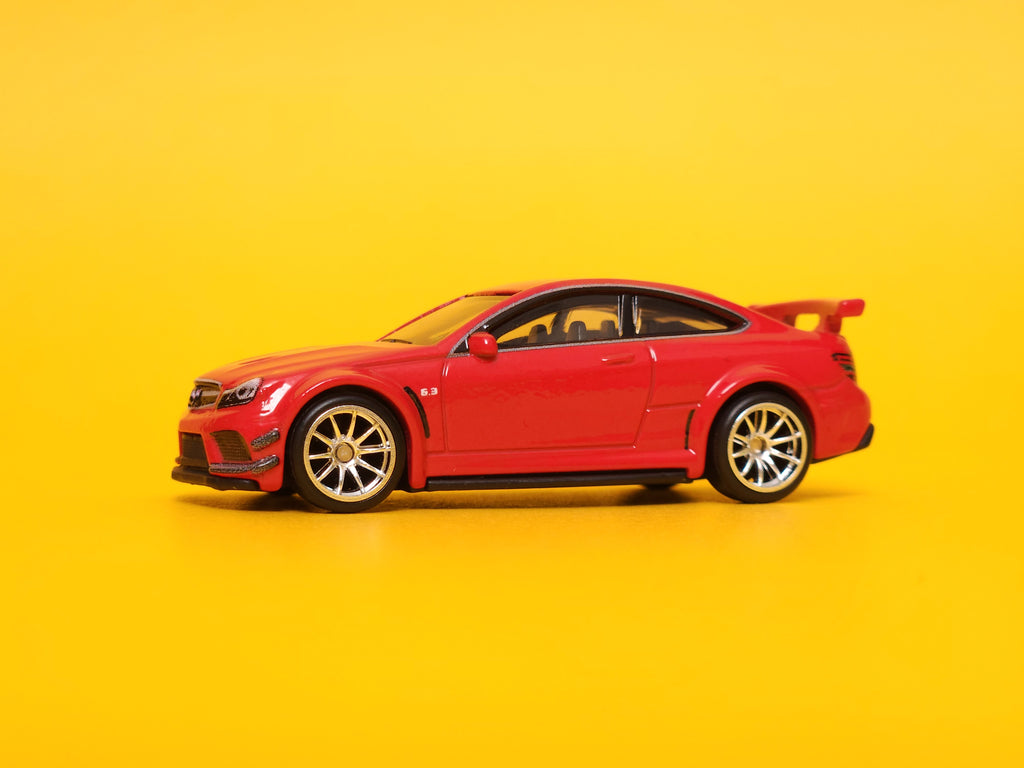2012 Mercedes-Benz C 63 AMG Coupe Black Series: Fire Opal – 2022 Mattel Hot Wheels Premium 1st Edition