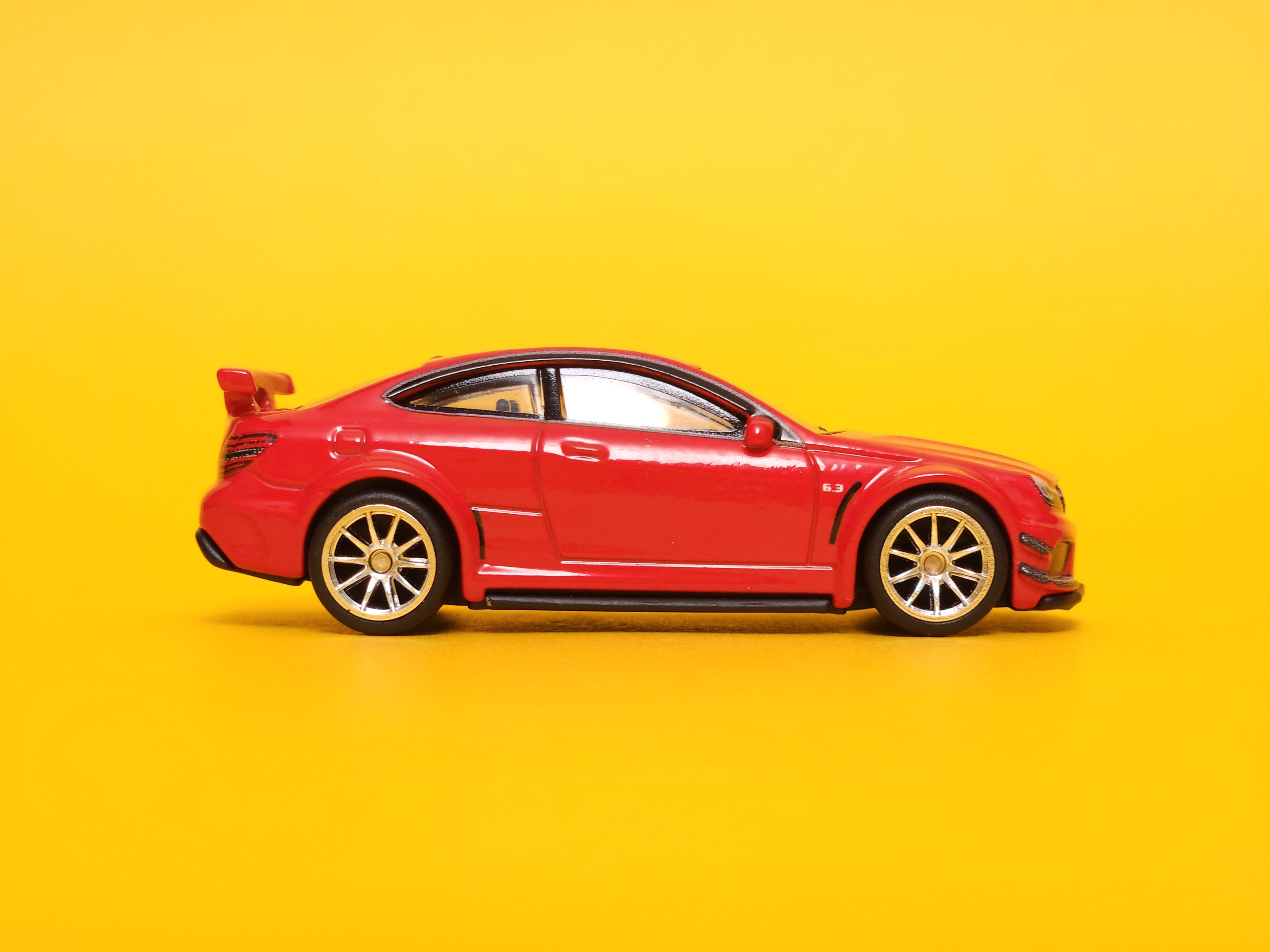 2012 Mercedes-Benz C 63 AMG Coupe Black Series: Fire Opal – 2022 Mattel Hot Wheels Premium 1st Edition