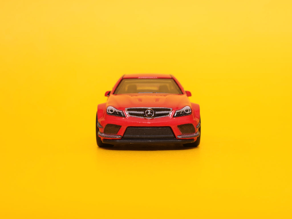 2012 Mercedes-Benz C 63 AMG Coupe Black Series: Fire Opal – 2022 Mattel Hot Wheels Premium 1st Edition