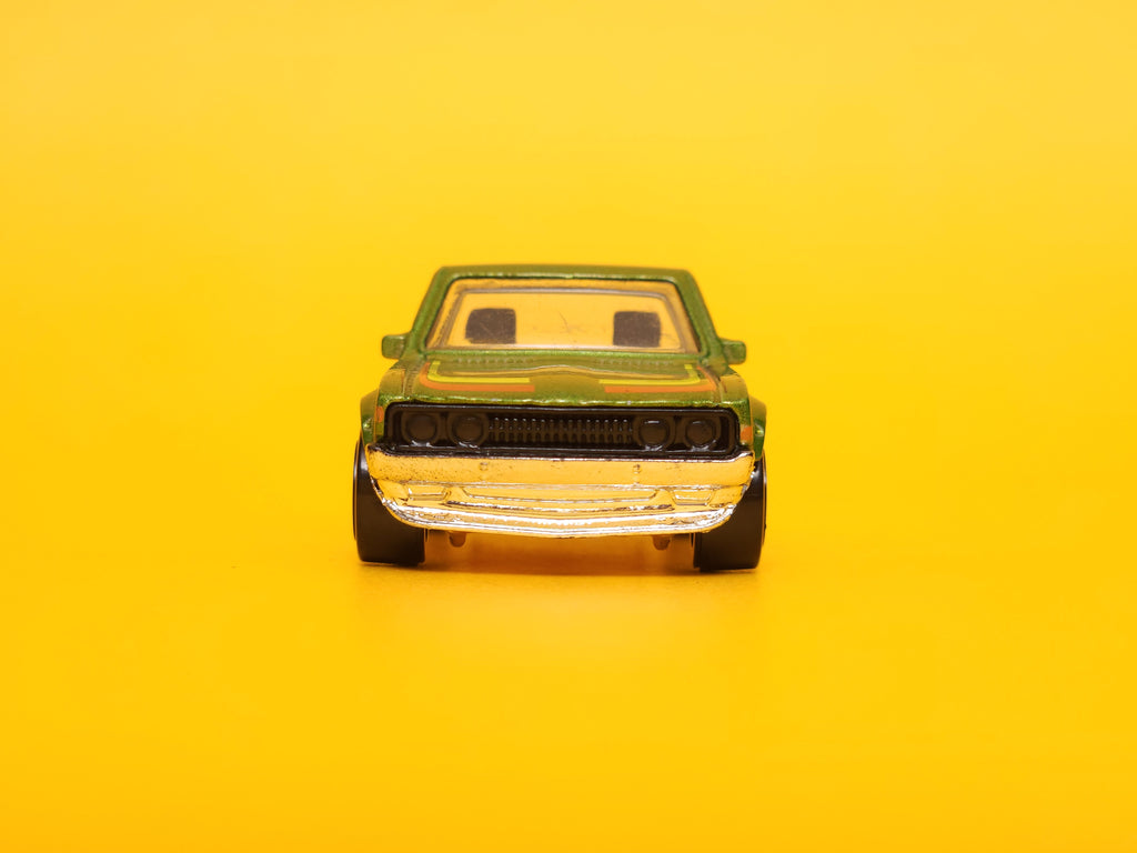Datsun 620: Metalflake Green – 2015 Mattel Hot Wheels Basic