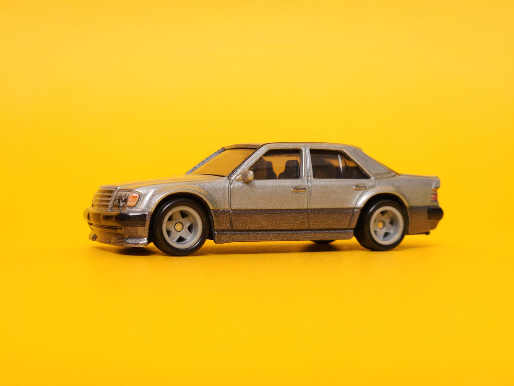 Mercedes-Benz 500 E: Metalflake Silver & Gunmetal Gray – 2023 Mattel Hot Wheels Premium