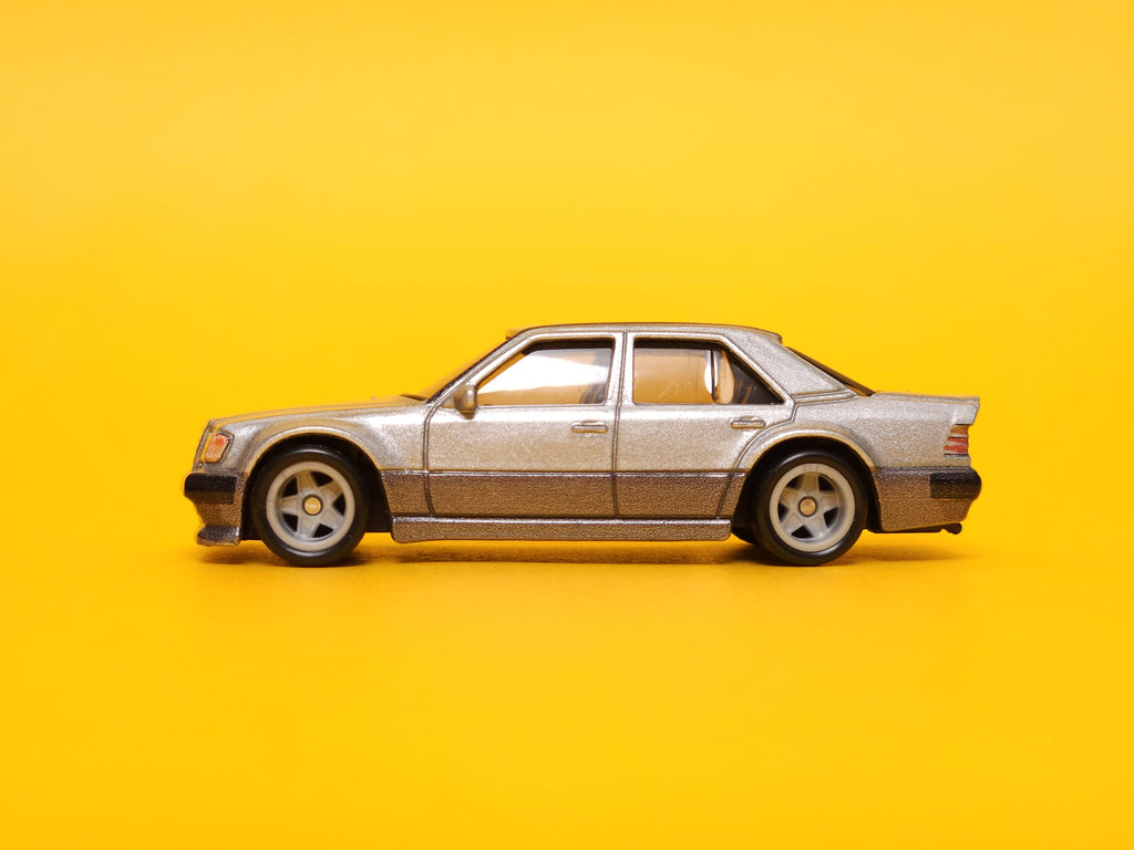 Mercedes-Benz 500 E: Metalflake Silver & Gunmetal Gray – 2023 Mattel Hot Wheels Premium