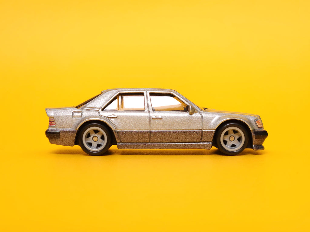 Mercedes-Benz 500 E: Metalflake Silver & Gunmetal Gray – 2023 Mattel Hot Wheels Premium