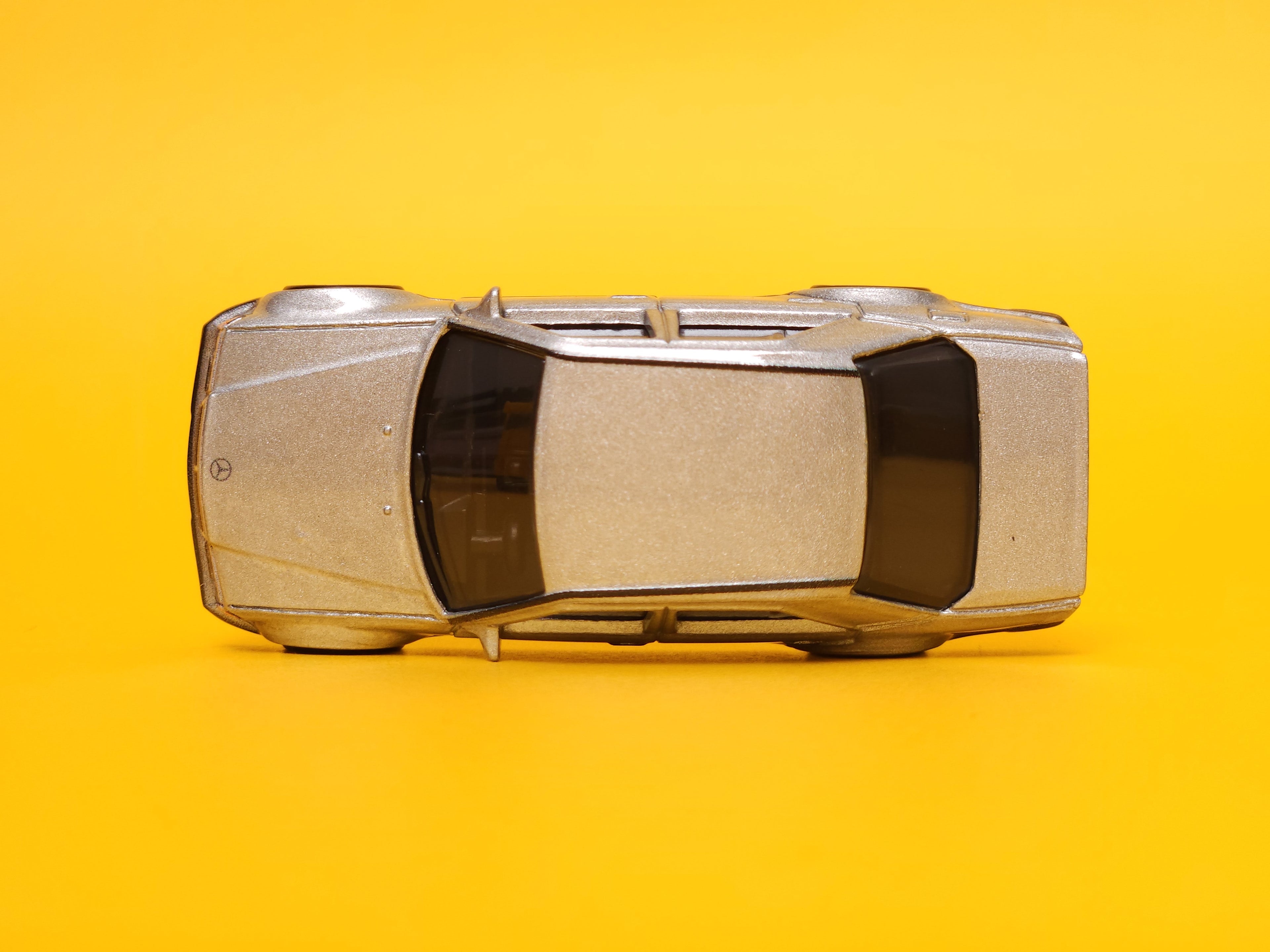 Mercedes-Benz 500 E: Metalflake Silver & Gunmetal Gray – 2023 Mattel Hot Wheels Premium