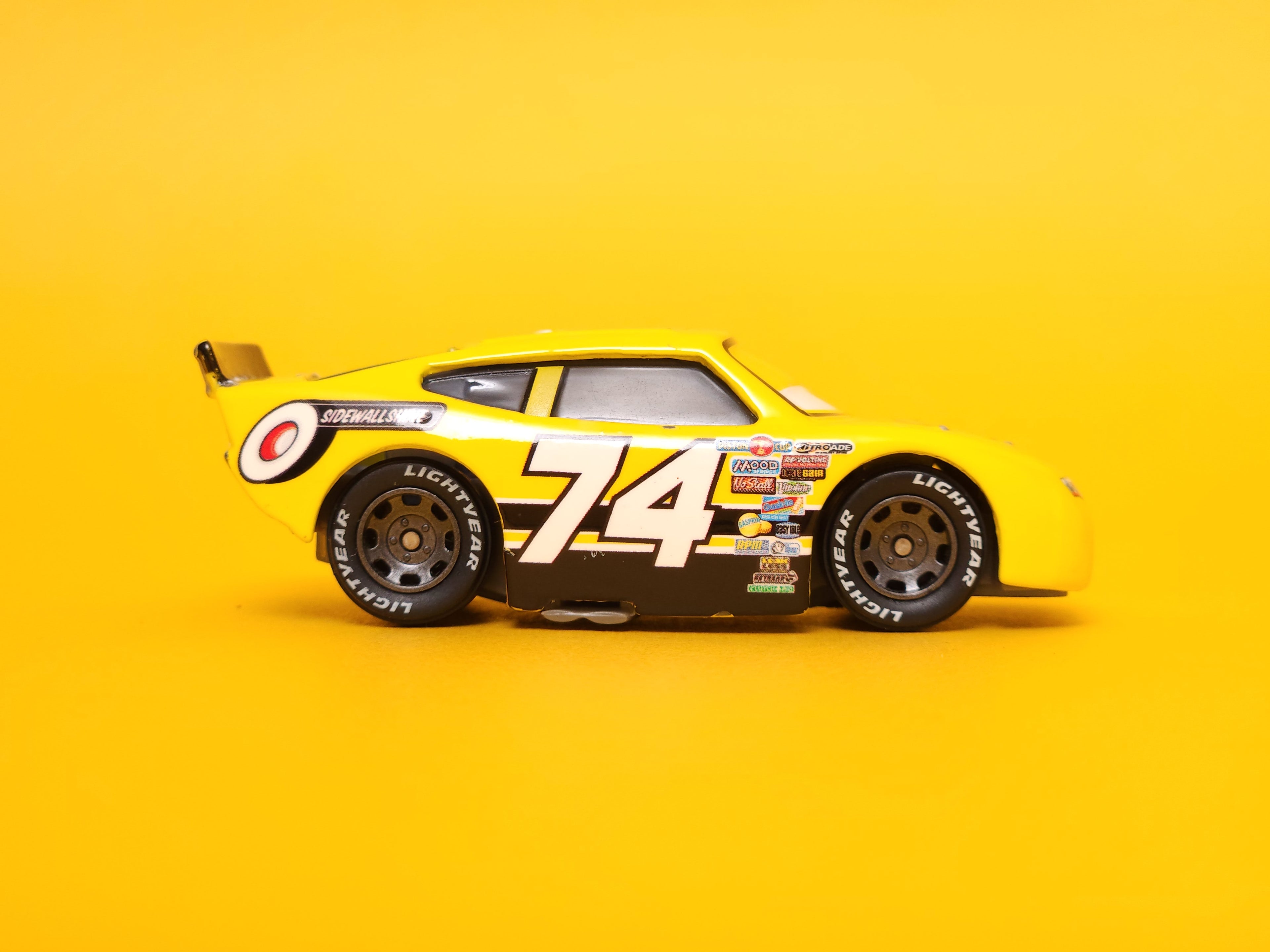 Slider Petrolski: Sidewall Shine #74 (Rubber Tires) – 2010 Mattel Disney Pixar Cars