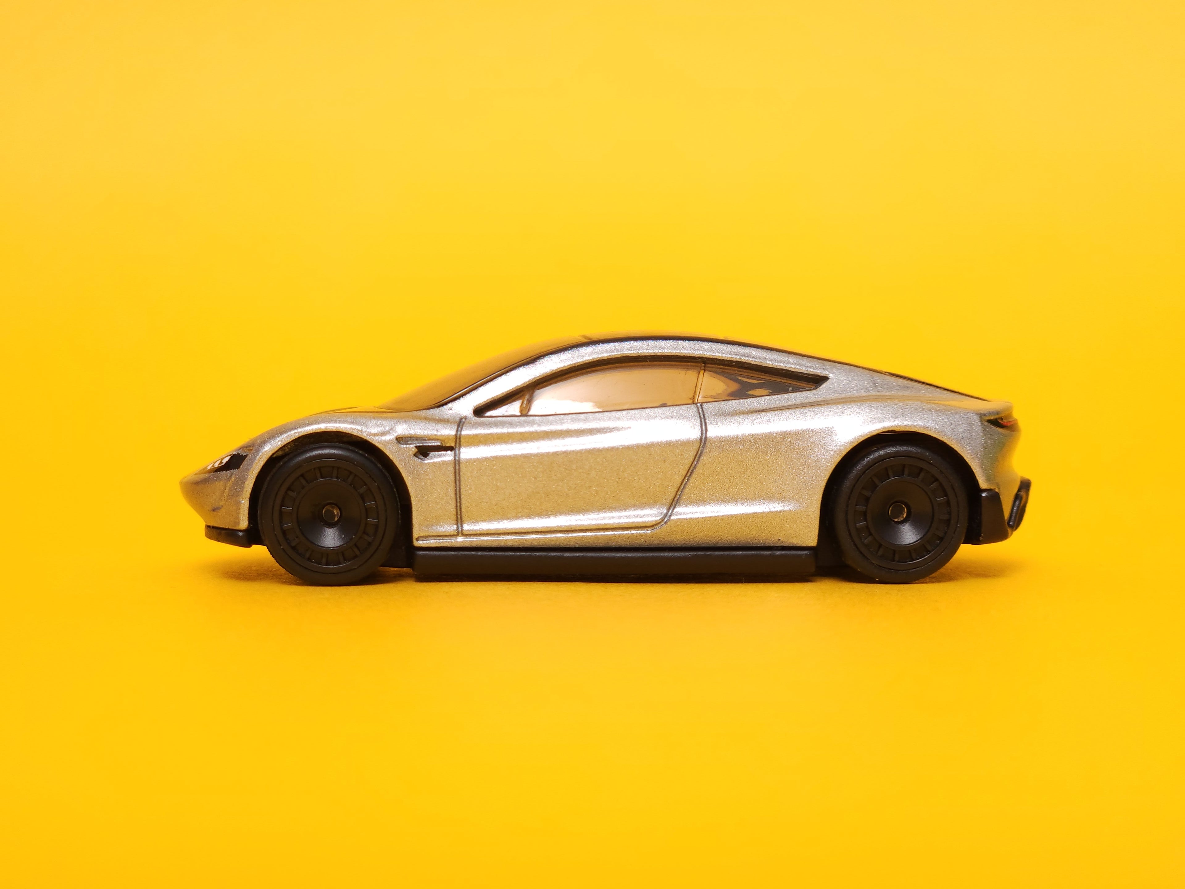 Tesla Roadster: Metalflake Silver – 2022 Mattel Hot Wheels Premium 1st Edition