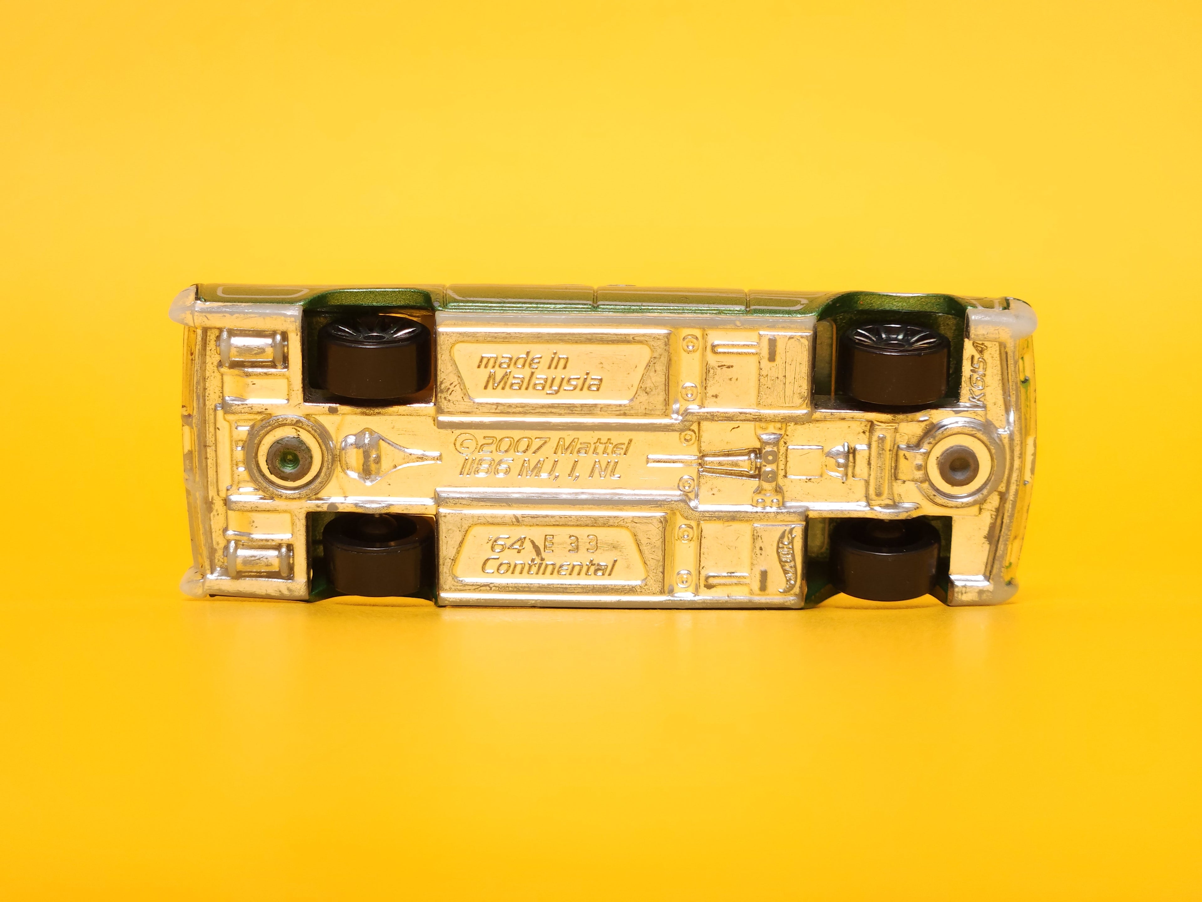 '64 Lincoln Continental: Metallic Dark Green – 2013 Mattel Hot Wheels Basic