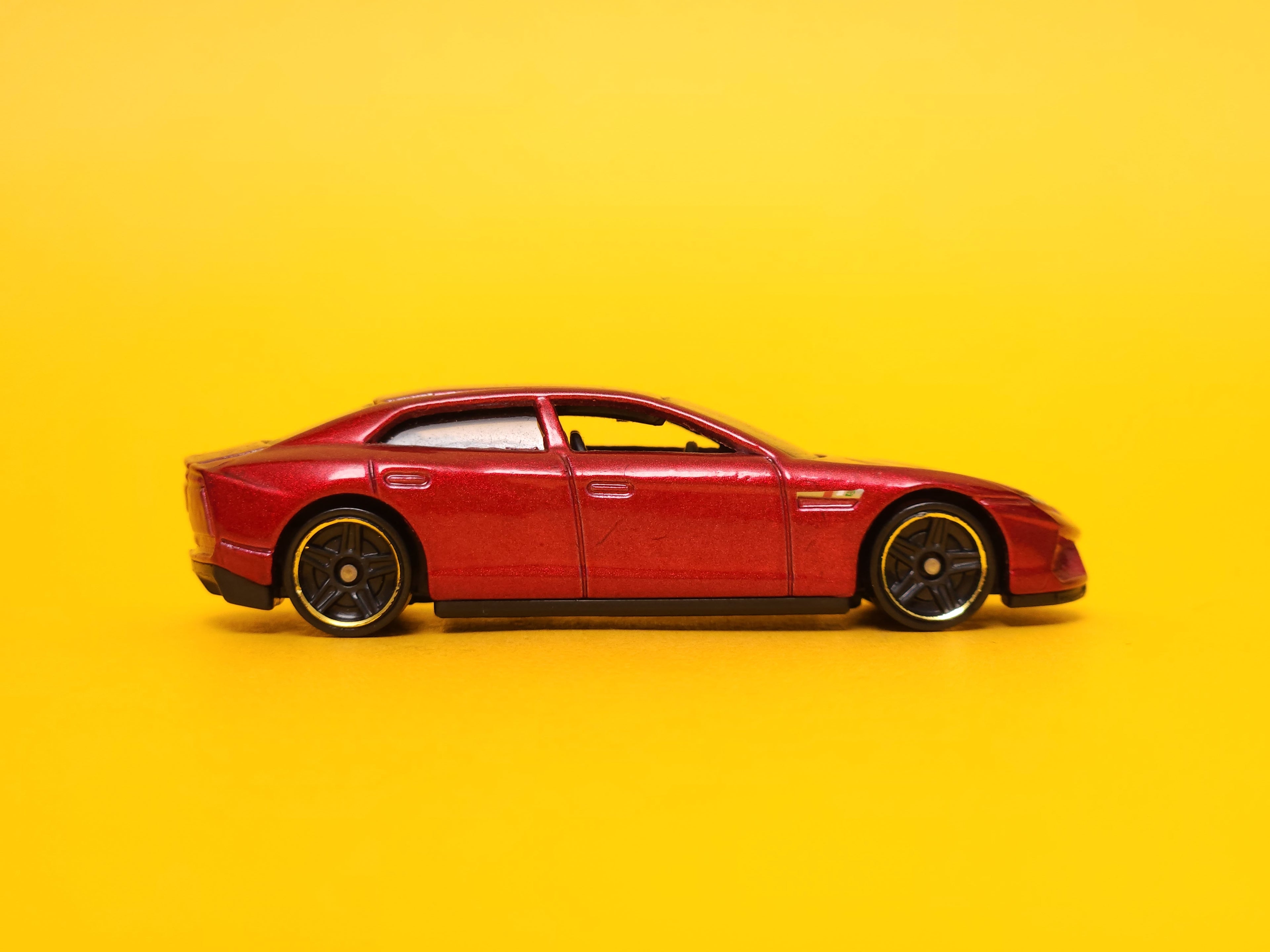 Lamborghini Estoque: Metalflake Burgundy – 2014 Mattel Hot Wheels Basic