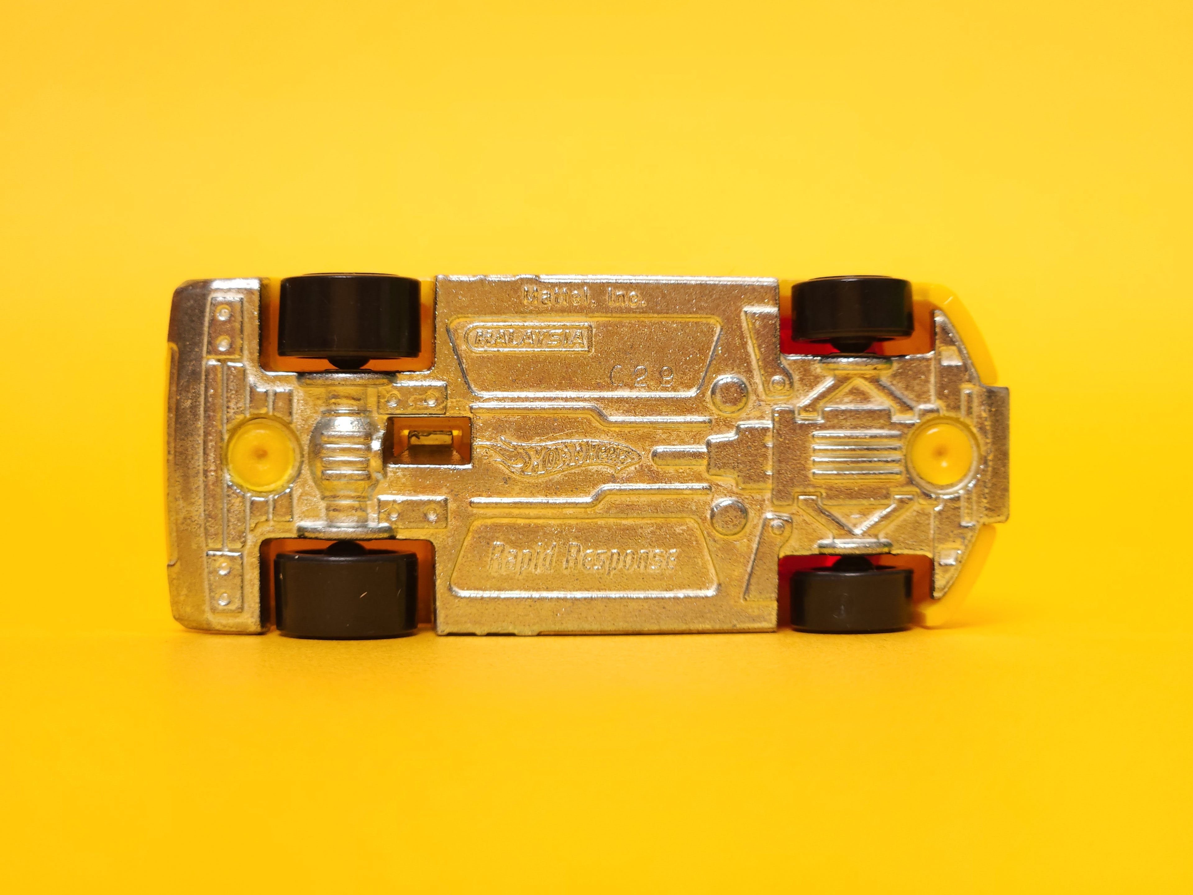 Rapid Response: Yellow – 2010 Mattel Hot Wheels Basic 1st Edition