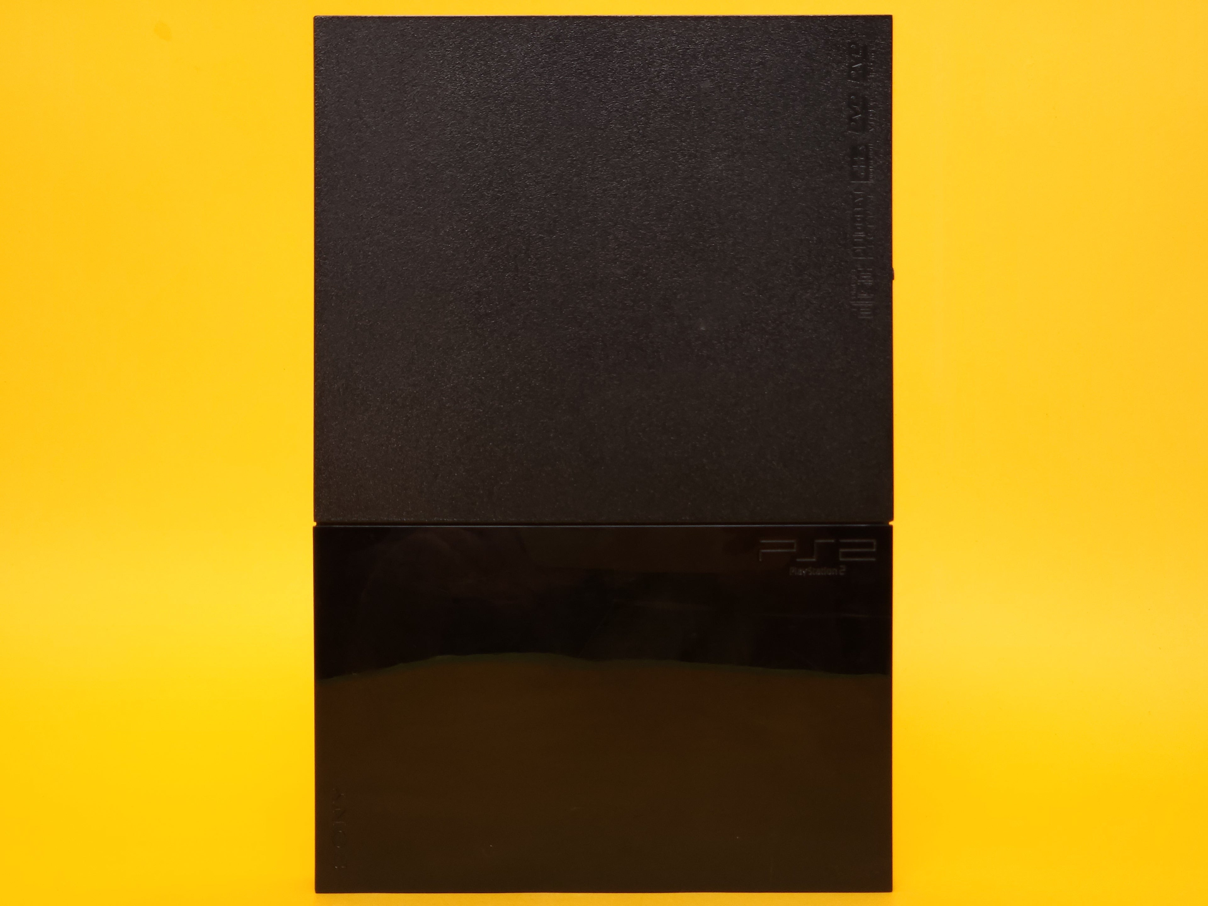 Black PlayStation 2 Slimline Console + Controller & Cables