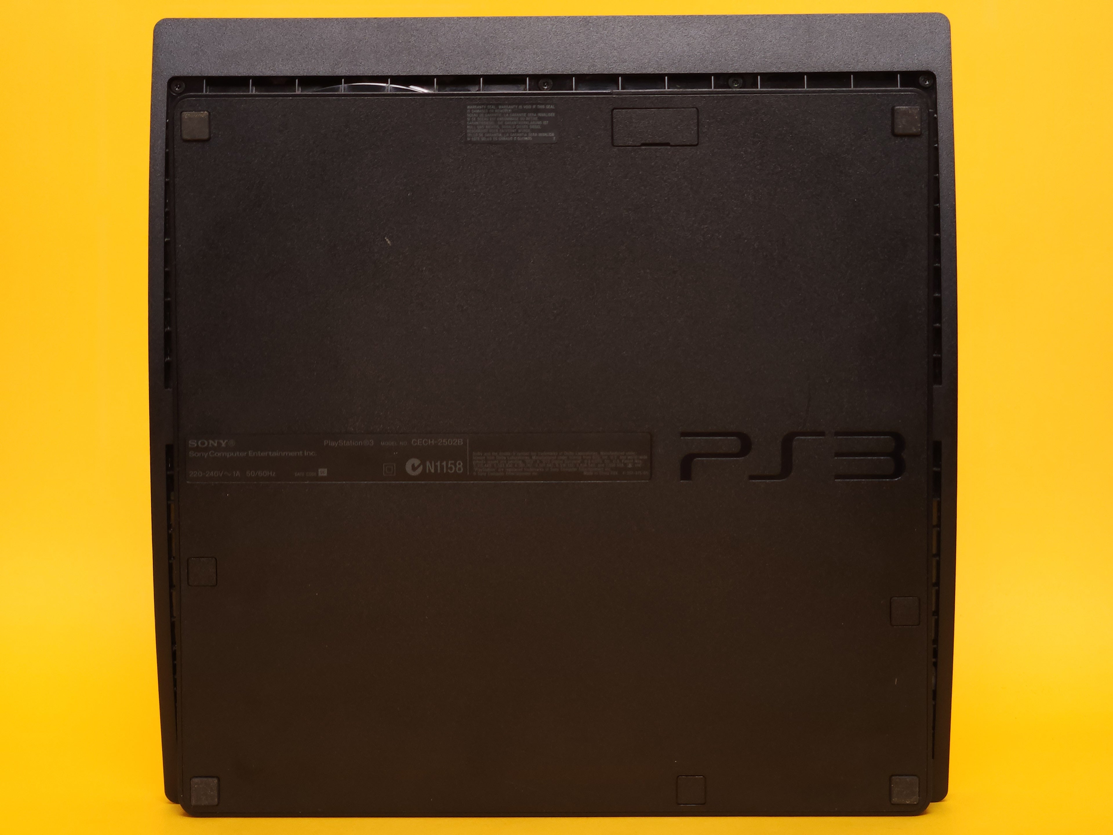 320GB Charcoal Black PlayStation 3 Slim Console + Scarlet Red Controller & Cables