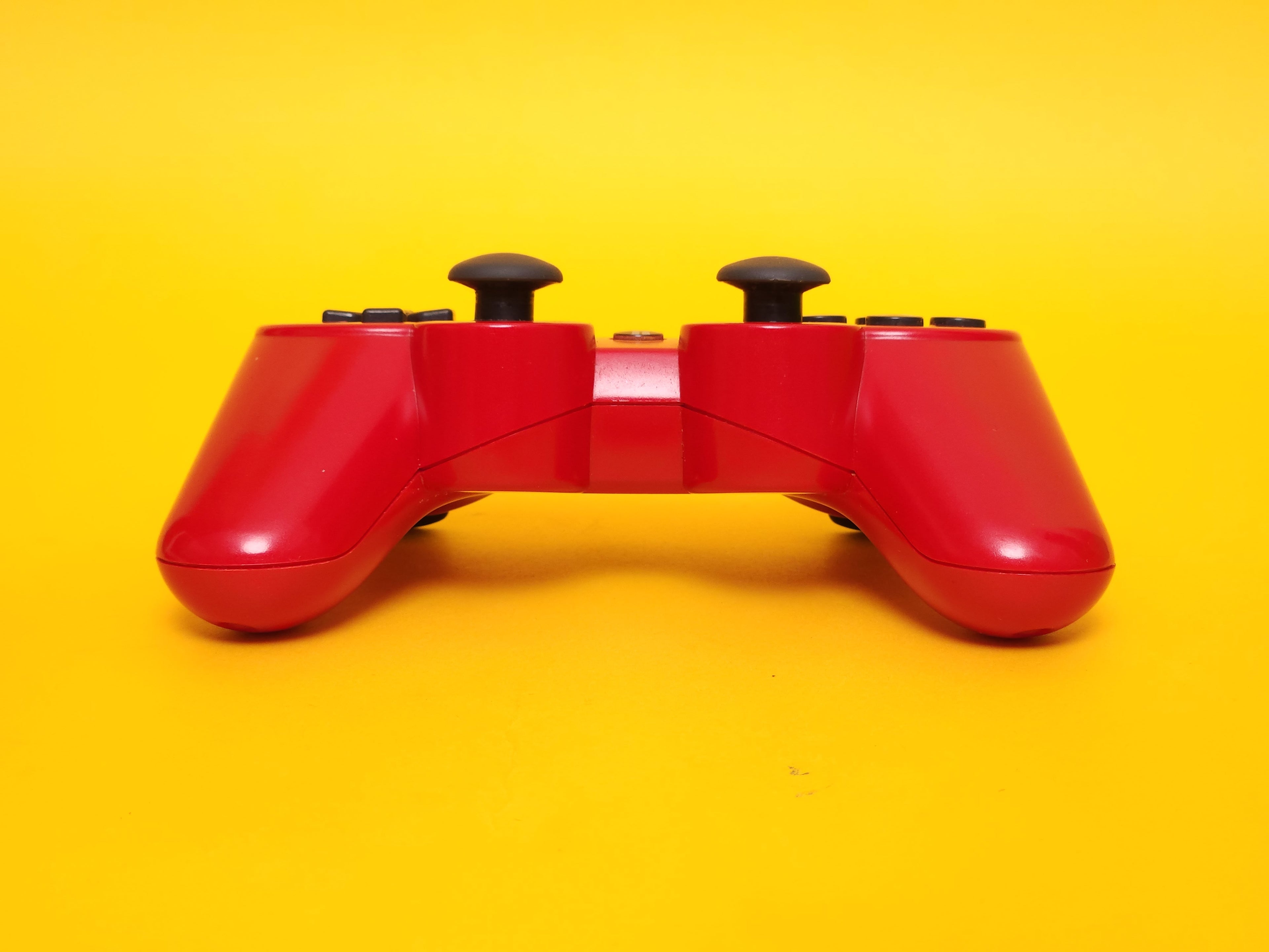 320GB Charcoal Black PlayStation 3 Slim Console + Scarlet Red Controller & Cables
