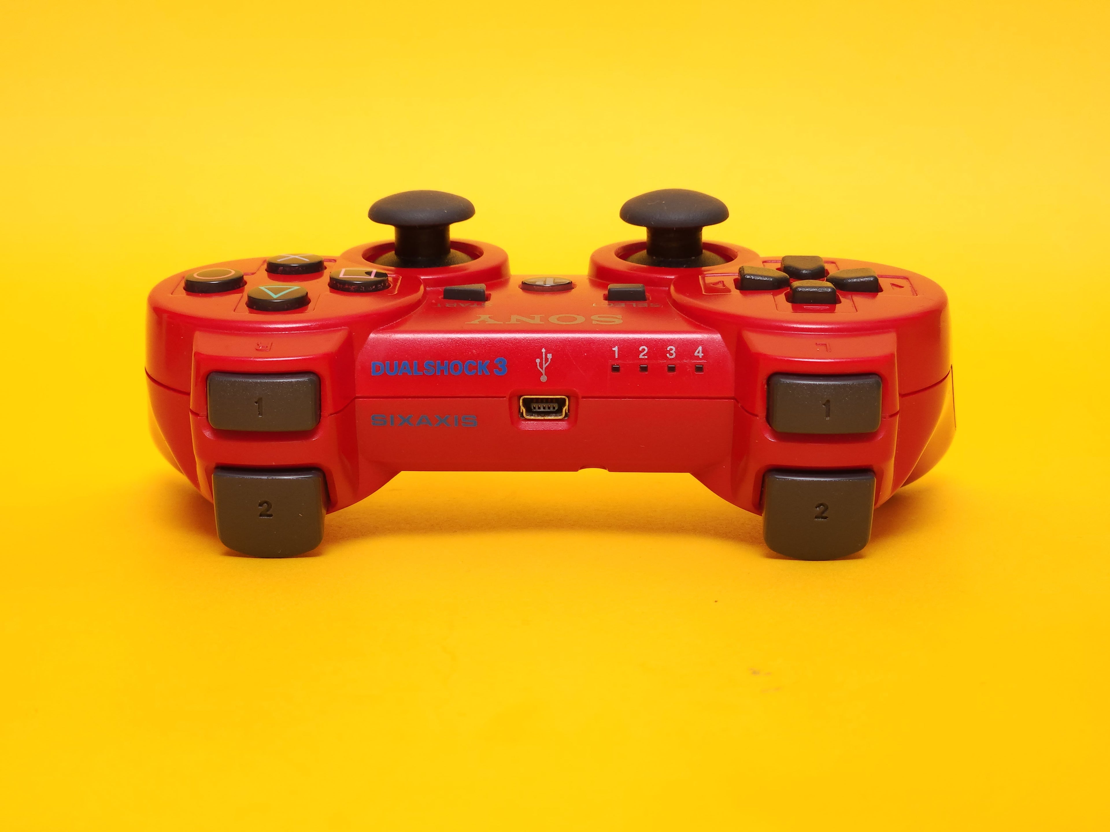 320GB Charcoal Black PlayStation 3 Slim Console + Scarlet Red Controller & Cables