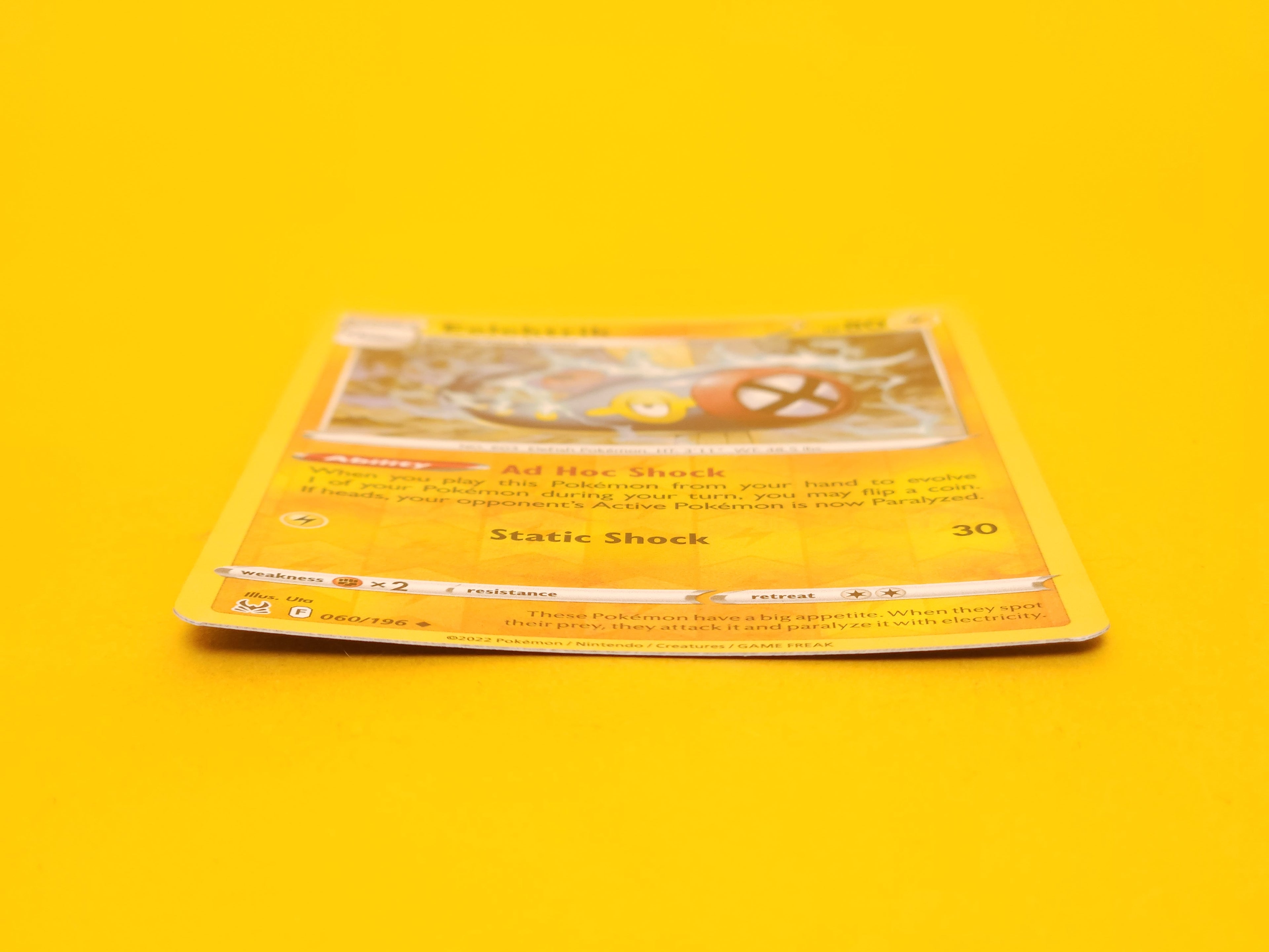 Eelektrik: 060/196 – 2022 Pokémon Uncommon Reverse Holofoil