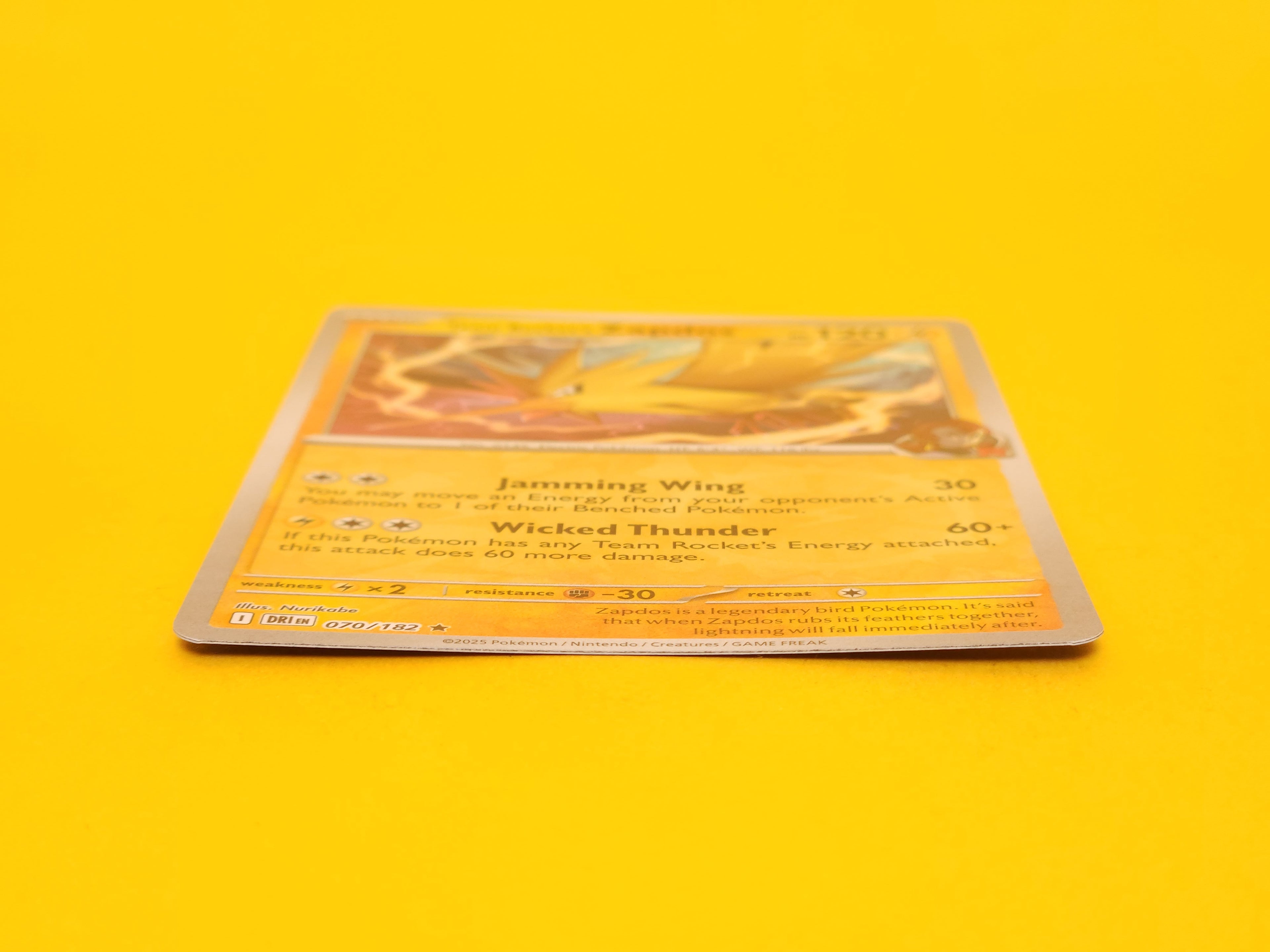 Team Rocket's Zapdos: 070/182 – 2025 Pokémon Rare Reverse Holofoil