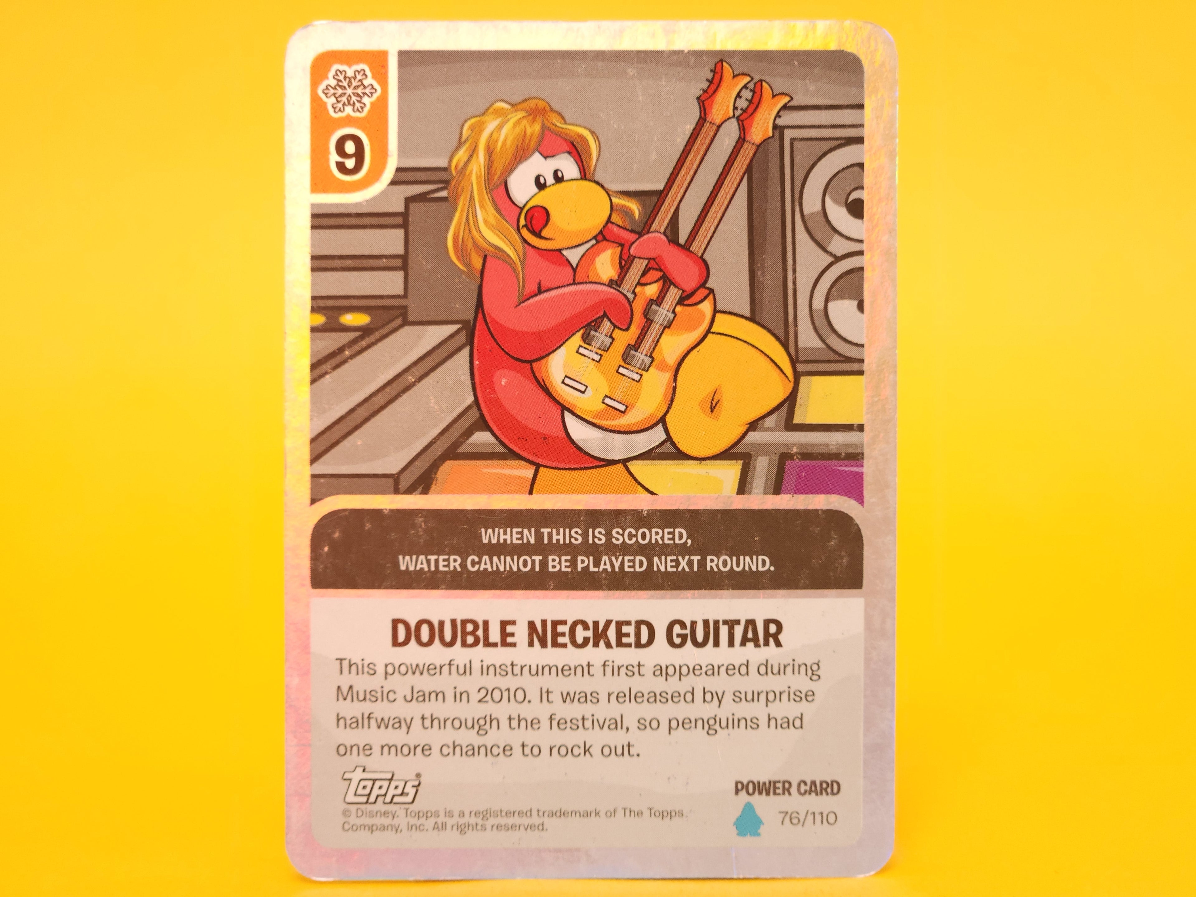 Double Necked Guitar: 76/110 – 2010 Topps Disney Club Penguin Holofoil